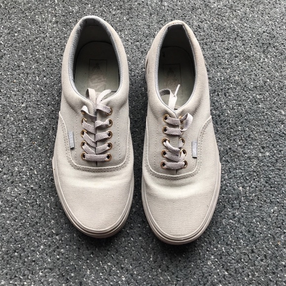 grey and gold vans